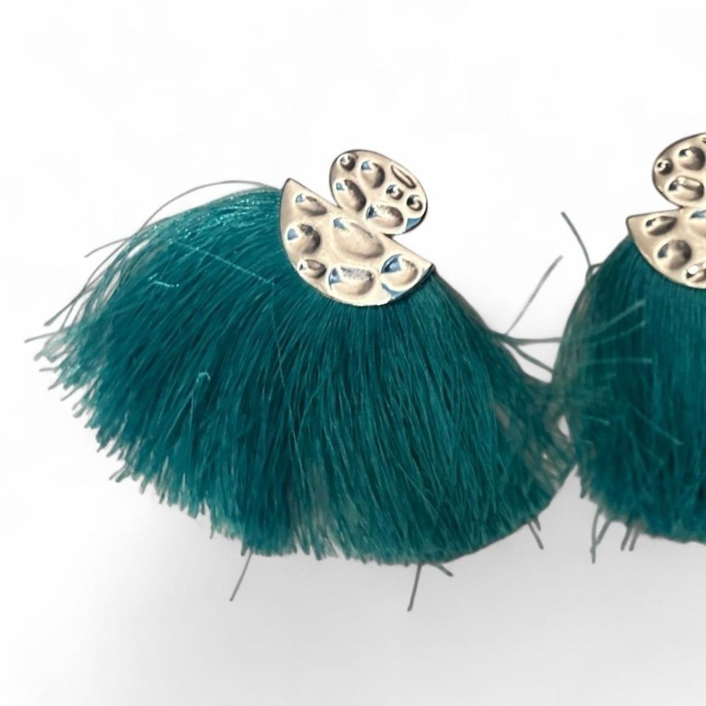 Green feather earrings with silver accents